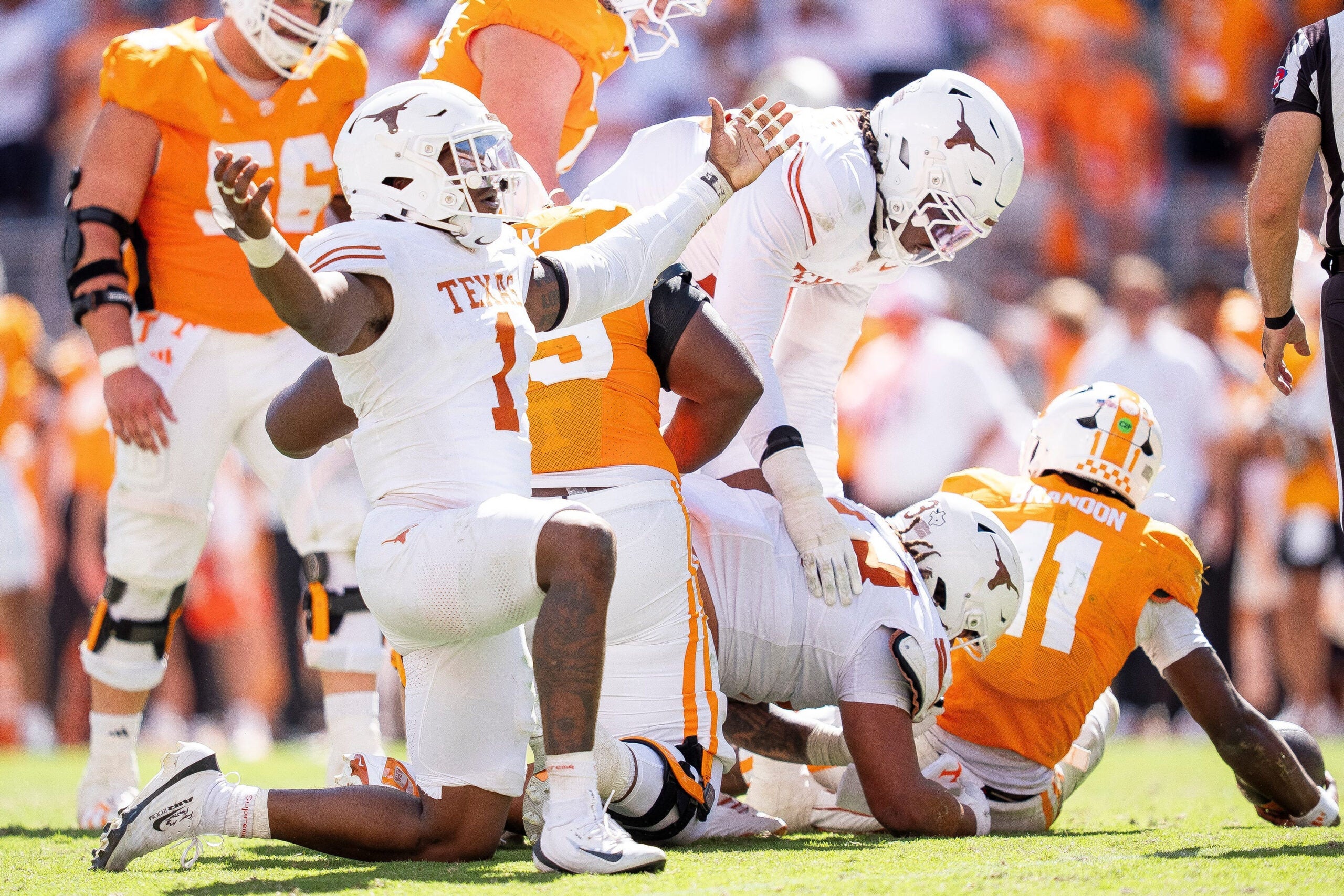 Texas defensive lineman Colin Simmons (1) celebrates after a sack of Tennessee quarterback Faizon Brandon (11) during their game at Neyland Stadium in Knoxville, Tenn. on Sept. 26, 2026.