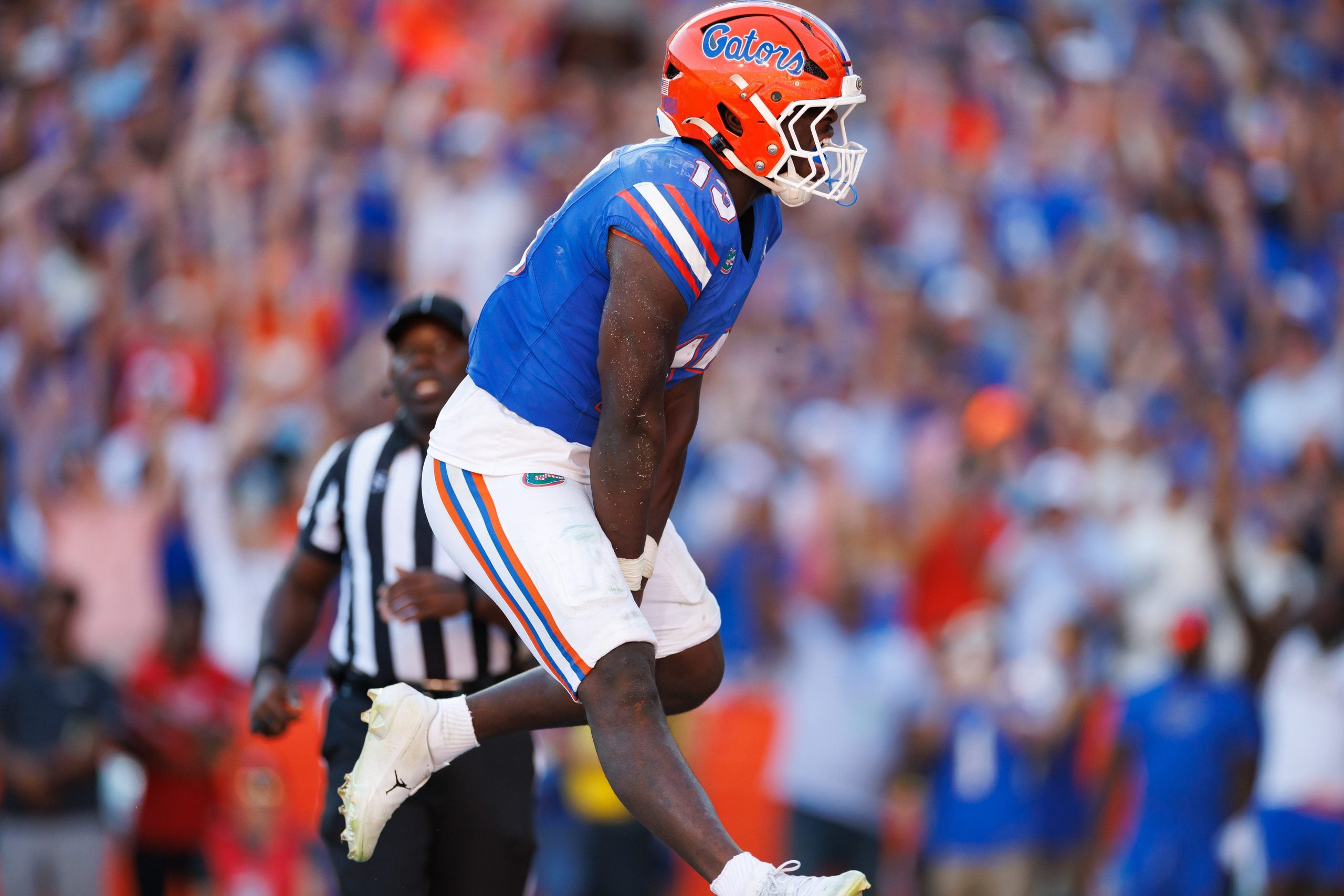 Sep 26, 2026; Gainesville, Florida, USA; Florida Gators running back Jadan Baugh (13) reacts after scoring a touchdown against the Mississippi Rebels during the first half at Ben Hill Griffin Stadium.