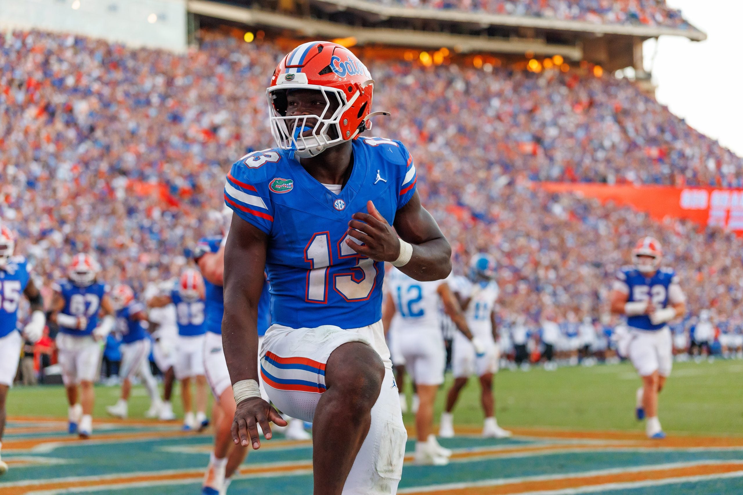 Sep 26, 2026; Gainesville, Florida, USA; Florida Gators running back Jadan Baugh (13) celebrates with a Heisman pose against the Mississippi Rebels during the second half at Ben Hill Griffin Stadium.