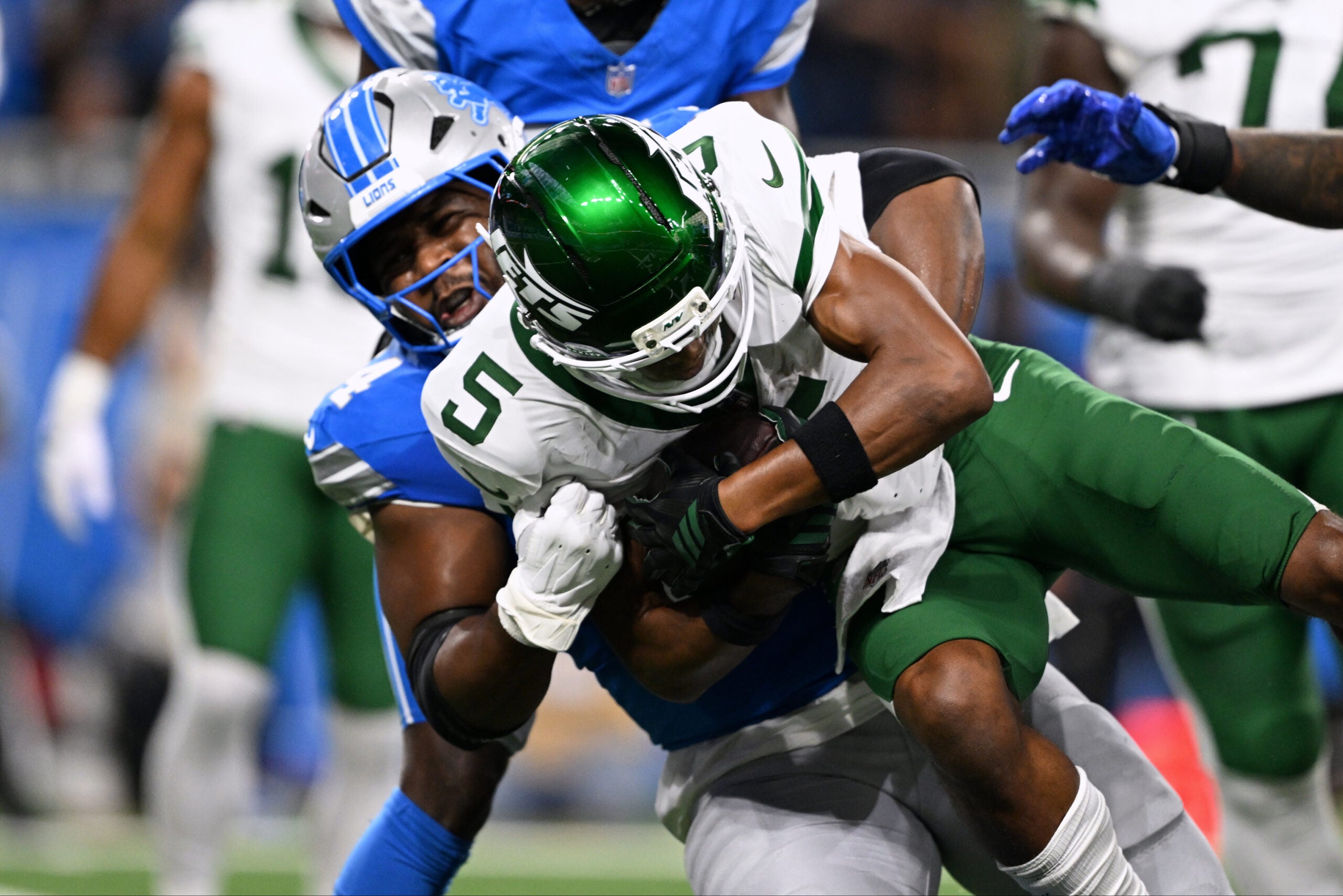 New York Jets' star receiver Garrett Wilson took a hit to the head against the Lions but cleared concussion protocol.