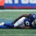 Sep 27, 2026; East Rutherford, New Jersey, USA; New York Giants linebacker Brian Burns (0) reacts after an apparent injury after a play against the Tennessee Titans during the fourth quarter at MetLife Stadium.