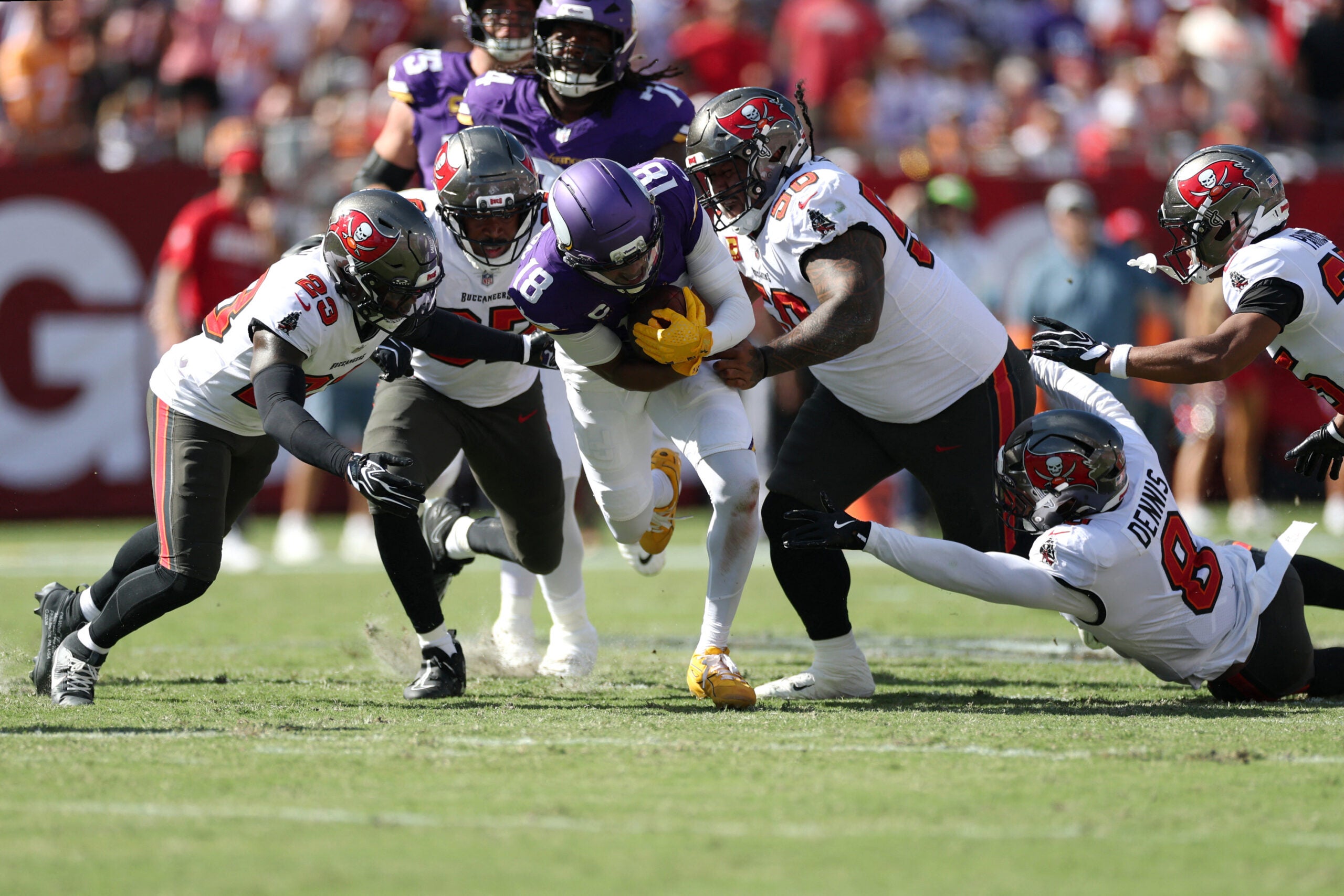Sep 27, 2026; Tampa, Florida, USA; Minnesota Vikings wide receiver Justin Jefferson (18) is tackled by the Tampa Bay Buccaneers during the first quarter at Raymond James Stadium.