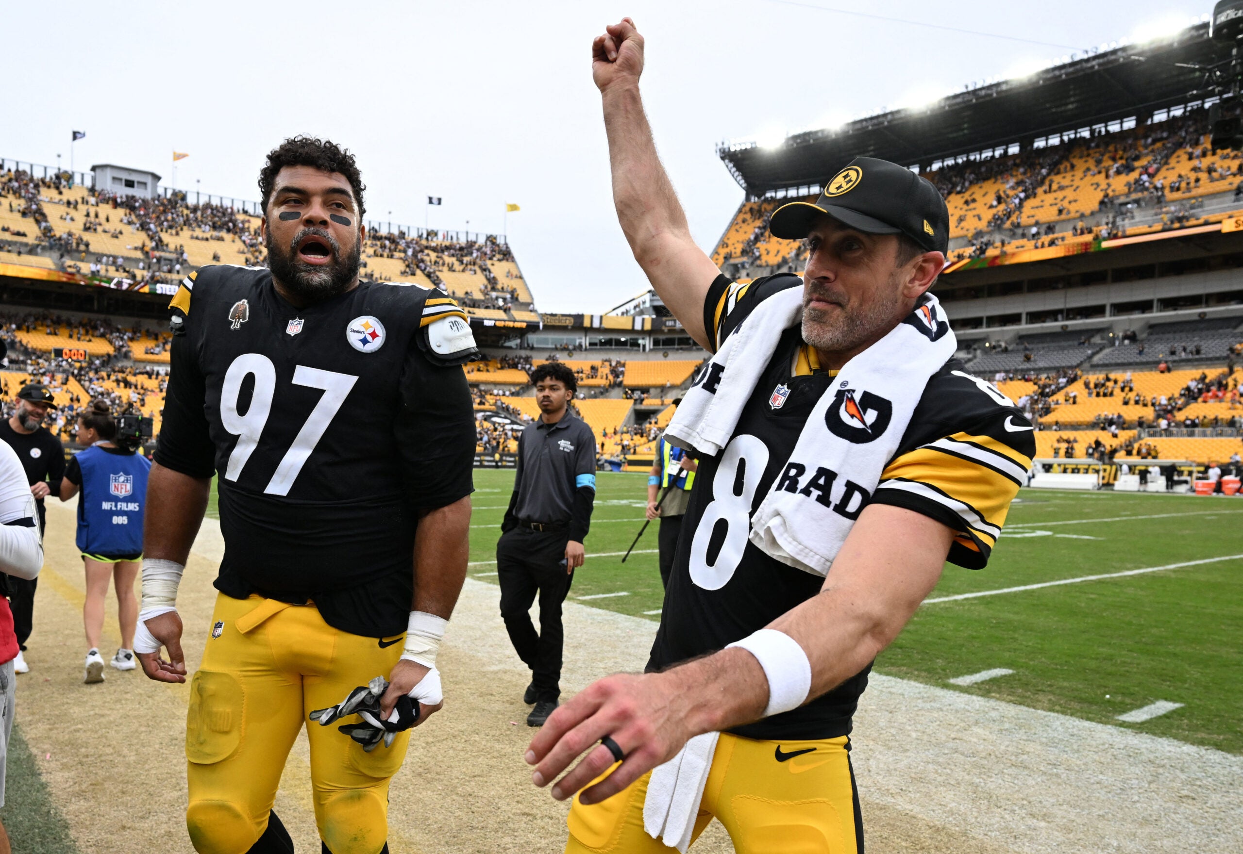 Sep 27, 2026; Pittsburgh, Pennsylvania, USA; Pittsburgh Steelers defensive tackle Cameron Heyward (97) and quarterback Aaron Rodgers (8) celebrate after a win against the Cincinnati Bengals at Acrisure Stadium.