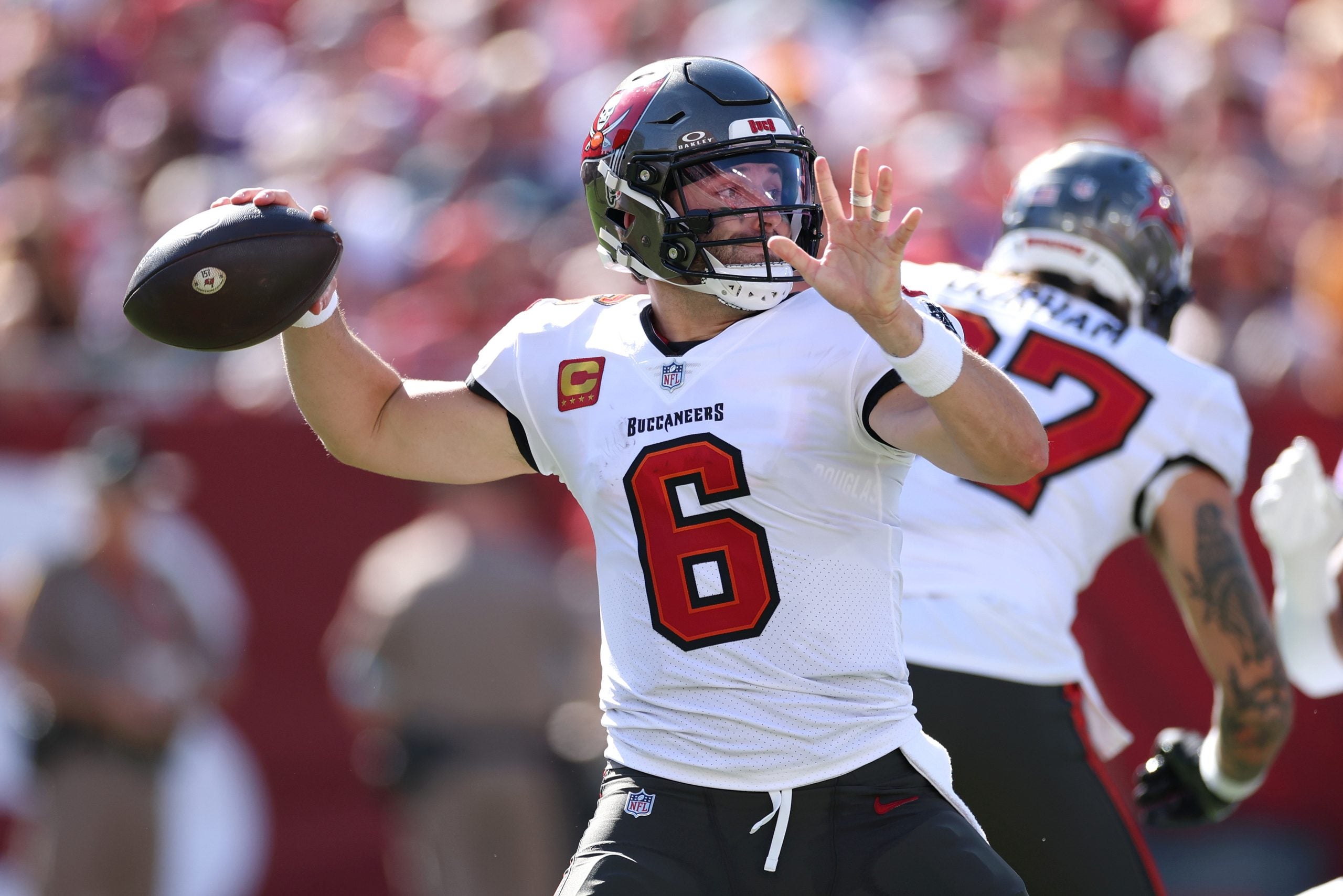 Sep 27, 2026; Tampa, Florida, USA; Tampa Bay Buccaneers quarterback Baker Mayfield (6) passes the ball against the Minnesota Vikings during the first quarter at Raymond James Stadium.