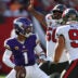 Sep 27, 2026; Tampa, Florida, USA; Minnesota Vikings quarterback Kyler Murray (1) under pressure from Tampa Bay Buccaneers nose tackle Vita Vea (50) and linebacker Anthony Nelson (98) during the second quarter at Raymond James Stadium.