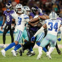 Football - NFL - Baltimore Ravens v Dallas Cowboys - Estadio Maracana, Rio de Janeiro, Brazil - September 27, 2026 Baltimore Ravens' Justice Hill in action with Dallas Cowboys' Shavon Revel Jr.