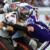 Sep 27, 2026; Tampa, Florida, USA; Minnesota Vikings linebacker Blake Cashman (51) tackles Tampa Bay Buccaneers quarterback Baker Mayfield (6) during the fourth quarter at Raymond James Stadium.