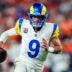 Sep 27, 2026; Denver, Colorado, USA; Los Angeles Rams quarterback Matthew Stafford (9) runs against the Denver Broncos during the second halfat Empower Field at Mile High.
