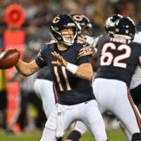 Sep 28, 2026; Chicago, Illinois, USA; Chicago Bears quarterback Case Keenum (11) passes against the Philadelphia Eagles during the first half at Soldier Field.