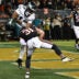 Sep 28, 2026; Chicago, Illinois, USA; Chicago Bears safety Dillon Thieneman (31) intercepts the ball against Philadelphia Eagles wide receiver Dontayvion Wicks (13) during the first half at Soldier Field.