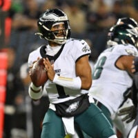 Sep 28, 2026; Chicago, Illinois, USA; Philadelphia Eagles quarterback Jalen Hurts (1) looks to pass against the Chicago Bears during the first half at Soldier Field.