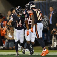 Sep 28, 2026; Chicago, Illinois, USA; Chicago Bears wide receiver Kalif Raymond (14) celebrates with wide receiver Luther Burden III (10) after scoring a touchdown against the Philadelphia Eagles during the second half at Soldier Field.