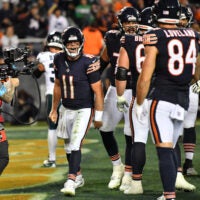 Sep 28, 2026; Chicago, Illinois, USA; Chicago Bears quarterback Case Keenum (11) celebrates after scoring a touchdown against the Philadelphia Eagles during the second half at Soldier Field.