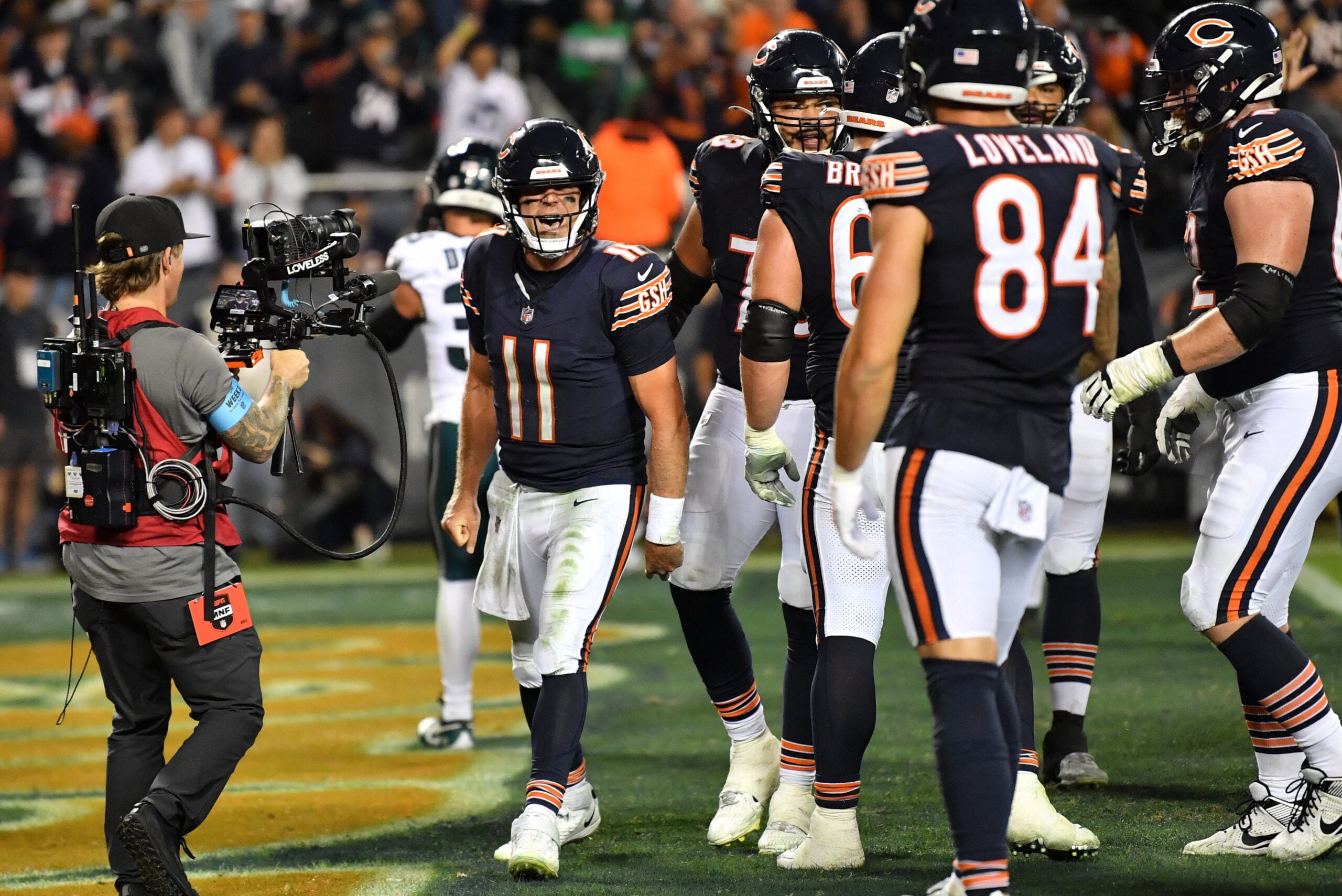 Sep 28, 2026; Chicago, Illinois, USA; Chicago Bears quarterback Case Keenum (11) celebrates after scoring a touchdown against the Philadelphia Eagles during the second half at Soldier Field.