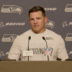 Seattle Seahawks HC Mike Macdonald talks to reporters postgame following win over New England Patriots.
