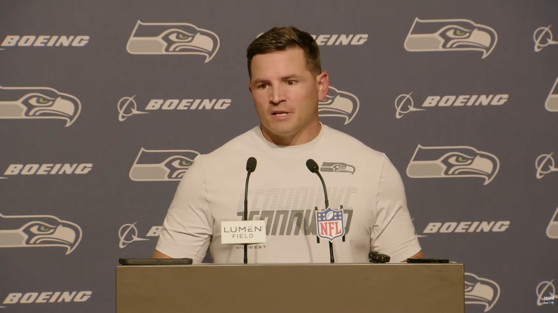 Seattle Seahawks HC Mike Macdonald talks to reporters postgame following win over New England Patriots.