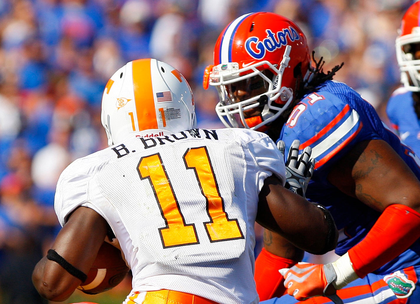 September 19, 2009; Gainesville FL, USA; Florida Gators linebacker Brandon Spikes (51) tackles Tennessee Volunteers running back Bryce Brown (11) during the first half at Ben Hill Griffin Stadium.
