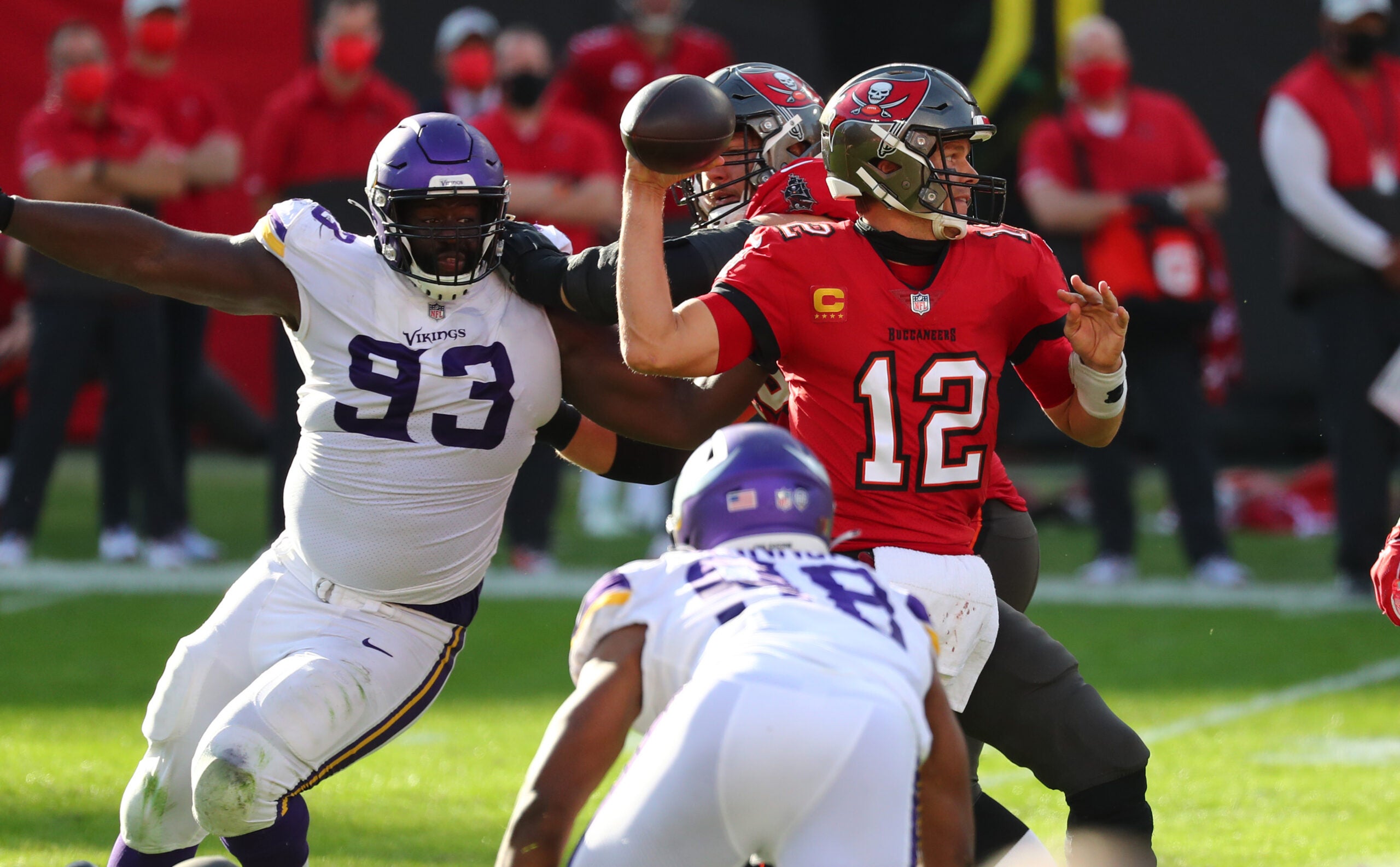 Dec 13, 2020; Tampa, Florida, USA; Tampa Bay Buccaneers quarterback Tom Brady (12) throws a pass as Minnesota Vikings defensive tackle Shamar Stephen (93) defends during the second half at Raymond James Stadium.