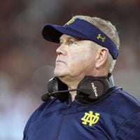 Nov 27, 2021; Stanford, California, USA; Notre Dame Fighting Irish head coach Brian Kelly walks on the field during the second quarter against the Stanford Cardinal at Stanford Stadium.