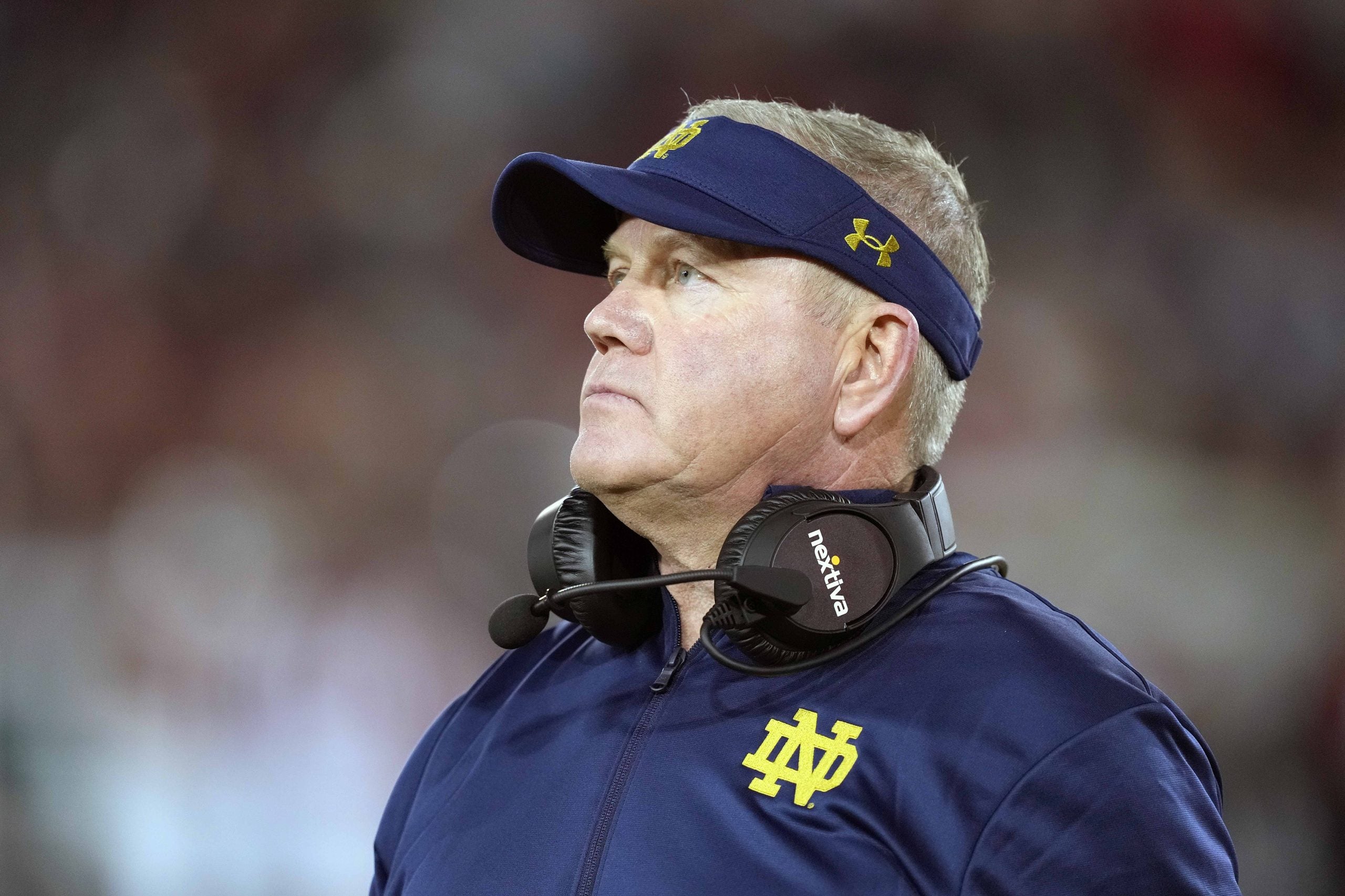 Nov 27, 2021; Stanford, California, USA; Notre Dame Fighting Irish head coach Brian Kelly walks on the field during the second quarter against the Stanford Cardinal at Stanford Stadium.