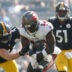 Oct 16, 2022; Pittsburgh, Pennsylvania, USA; Tampa Bay Buccaneers wide receiver Chris Godwin (14) makes a catch as Pittsburgh Steelers linebacker Robert Spillane (41) defends during the first quarter at Acrisure Stadium.