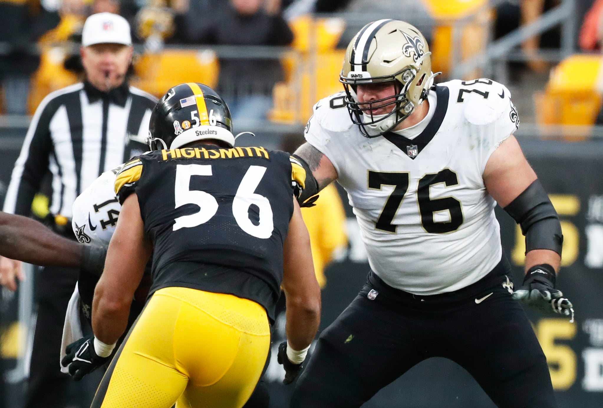 Nov 13, 2022; Pittsburgh, Pennsylvania, USA; New Orleans Saints offensive tackle Calvin Throckmorton (76) blocks at the line of scrimmage against Pittsburgh Steelers linebacker Alex Highsmith (56) during the third quarter at Acrisure Stadium.