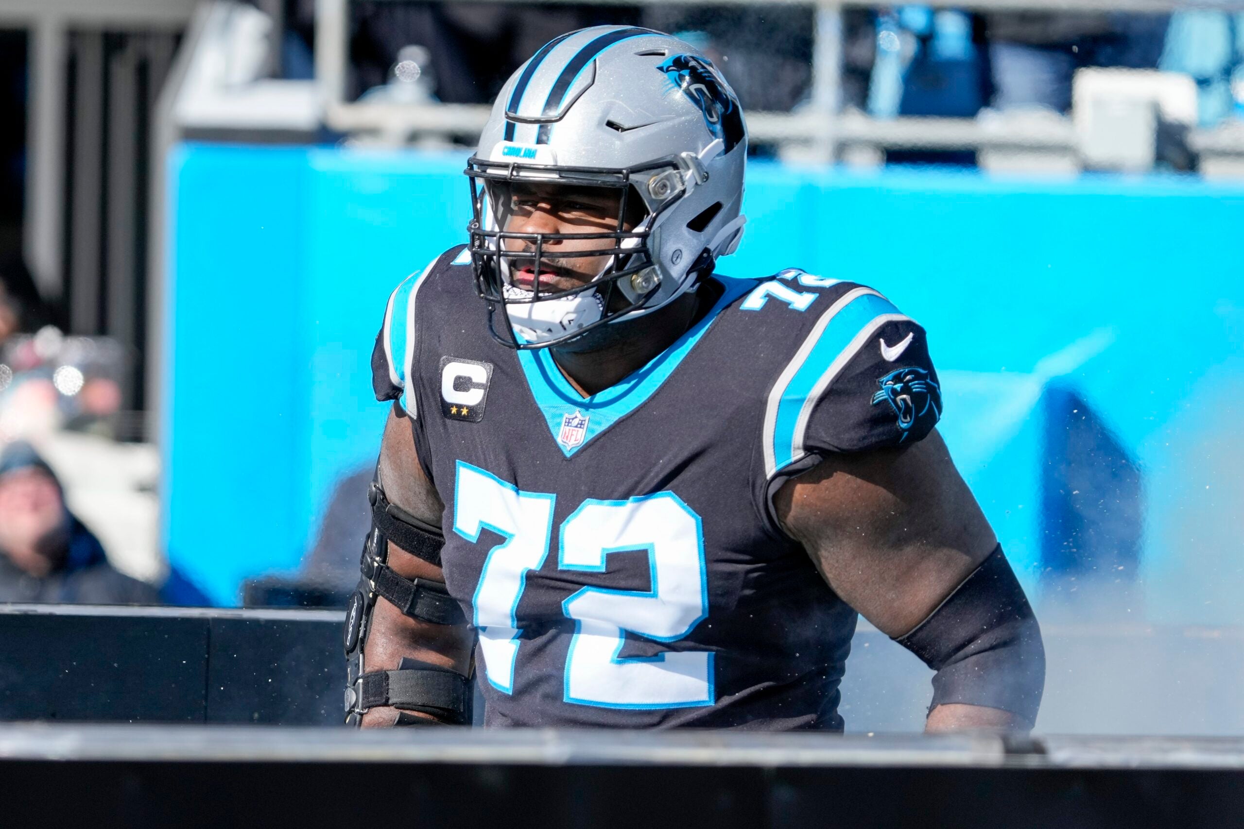 Dec 24, 2022; Charlotte, North Carolina, USA; Carolina Panthers offensive tackle Taylor Moton (72) takes the field during the first quarter against the Detroit Lions at Bank of America Stadium.