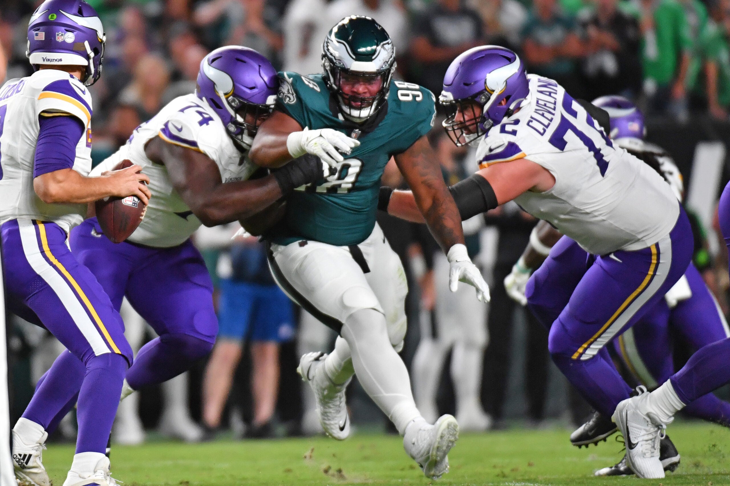 Sep 14, 2023; Philadelphia, Pennsylvania, USA; Philadelphia Eagles defensive tackle Jalen Carter (98) is blocked by Minnesota Vikings offensive tackle Olisaemeka Udoh (74) and guard Ezra Cleveland (72) at Lincoln Financial Field.