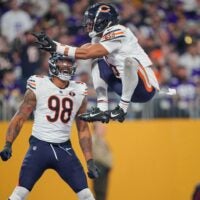 Nov 27, 2023; Minneapolis, Minnesota, USA; Chicago Bears cornerback Kyler Gordon (6) celebrates his interception against the Minnesota Vikings in the fourth quarter at U.S. Bank Stadium.
