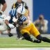 Indianapolis Colts wide receiver Josh Downs (1) is brought down by Pittsburgh Steelers linebacker Payton Wilson (41) on Sunday, Sept. 29, 2024, during a game against the Pittsburgh Steelers at Lucas Oil Stadium in Indianapolis.