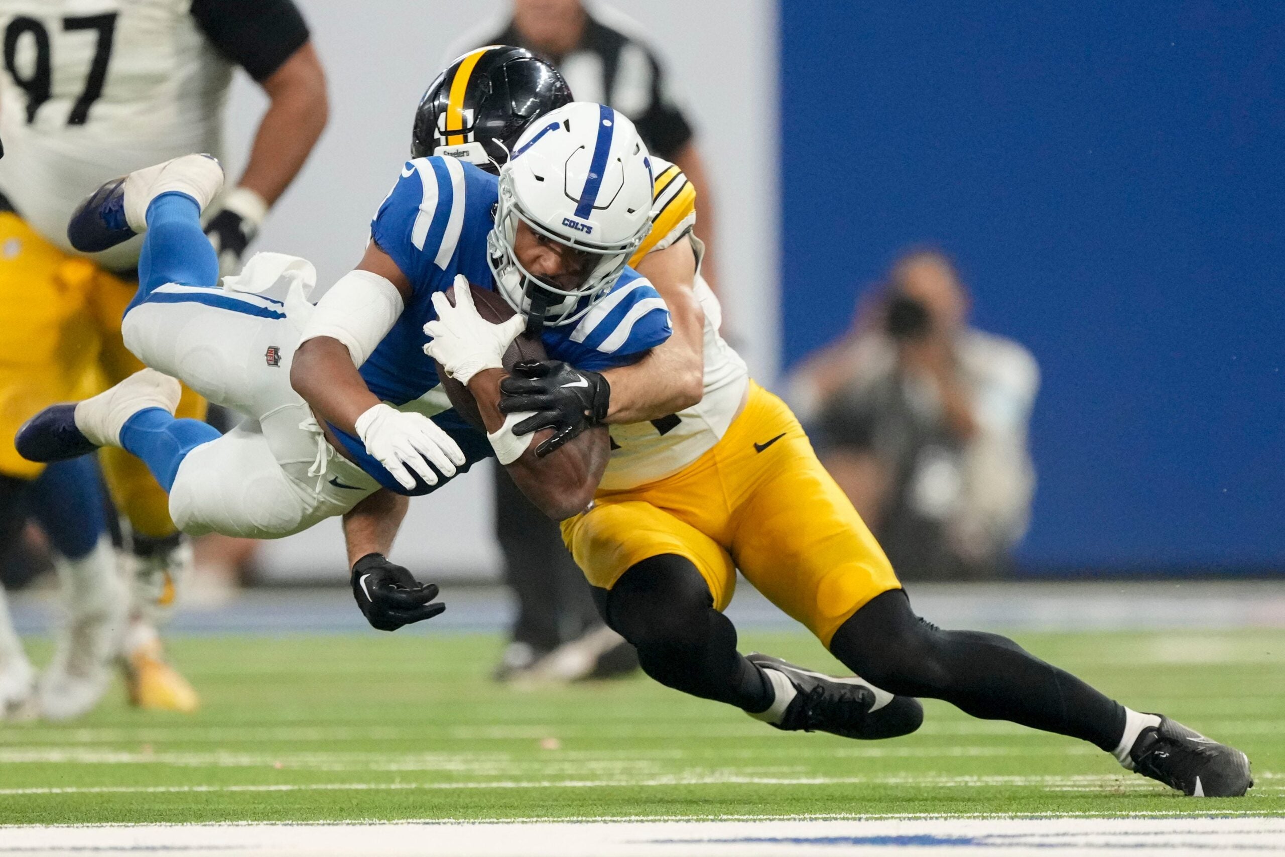 Indianapolis Colts wide receiver Josh Downs (1) is brought down by Pittsburgh Steelers linebacker Payton Wilson (41) on Sunday, Sept. 29, 2024, during a game against the Pittsburgh Steelers at Lucas Oil Stadium in Indianapolis.