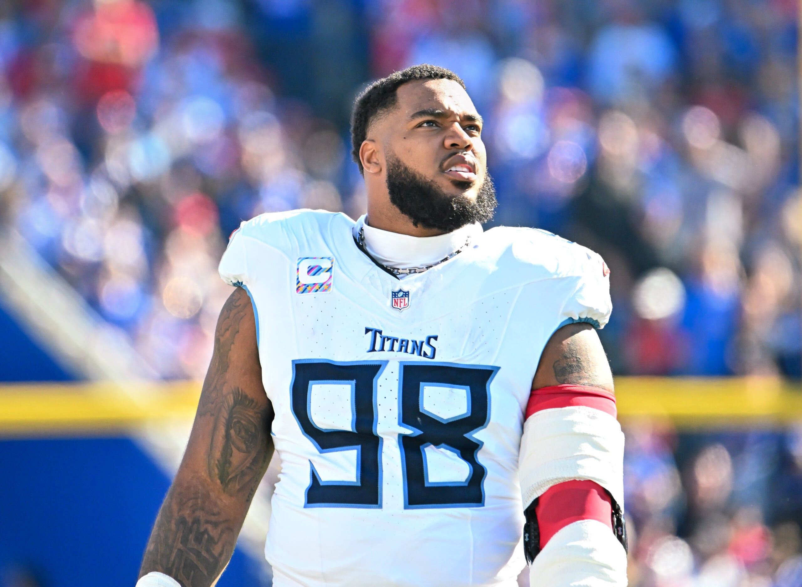Oct 20, 2024; Orchard Park, New York, USA; Tennessee Titans defensive tackle Jeffery Simmons (98) looks to the scoreboard in the second quarter game against the Buffalo Bills at Highmark Stadium.