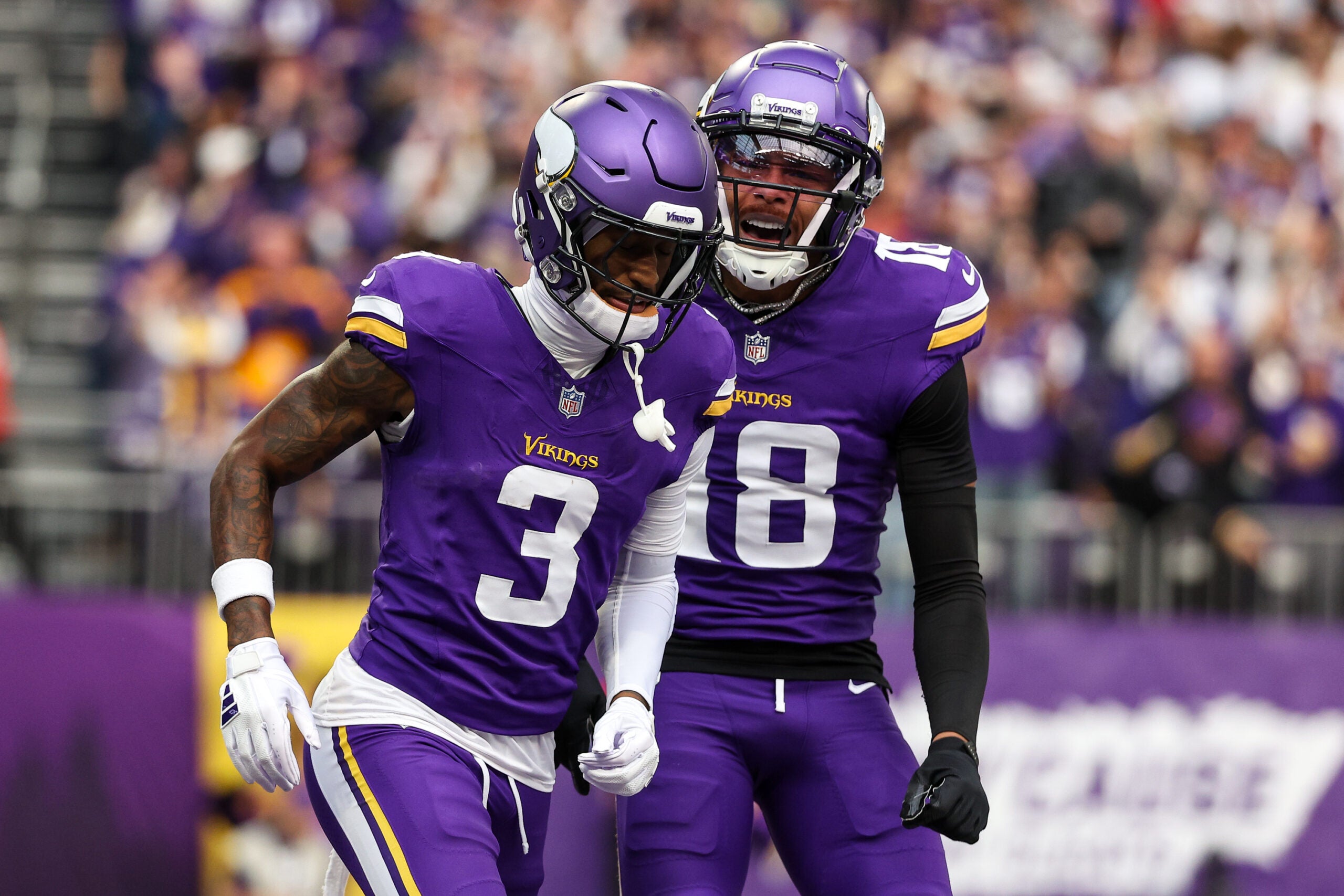 Dec 8, 2024; Minneapolis, Minnesota, USA; Minnesota Vikings wide receiver Jordan Addison (3) celebrates his touchdown with wide receiver Justin Jefferson (18) against the Atlanta Falcons during the first quarter at U.S. Bank Stadium.