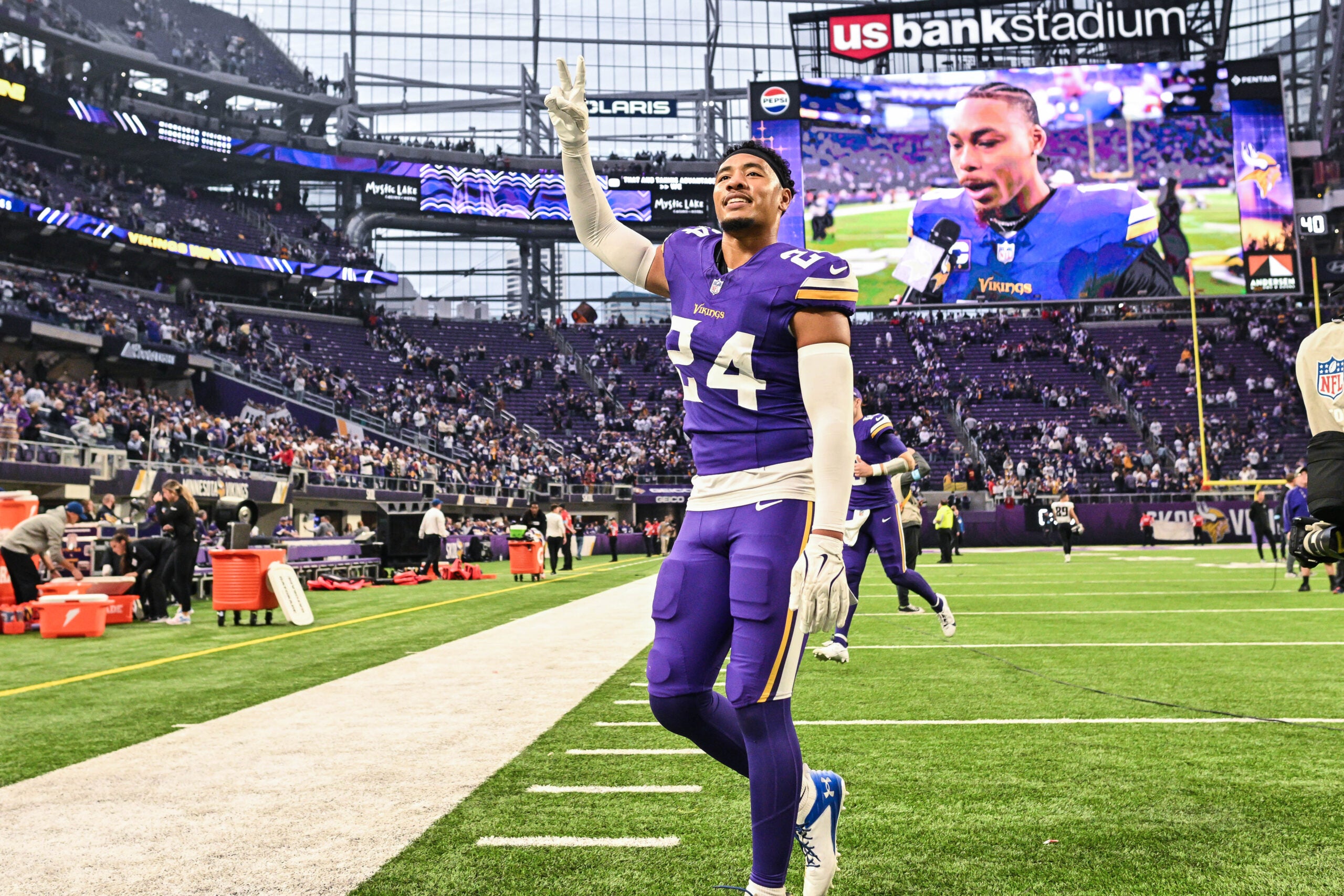 Dec 8, 2024; Minneapolis, Minnesota, USA; Minnesota Vikings safety Camryn Bynum (24) walks off the field after the game against the Atlanta Falcons at U.S. Bank Stadium.