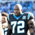 Dec 22, 2024; Charlotte, North Carolina, USA; Carolina Panthers offensive tackle Taylor Moton (72) on the sidelines before the game at Bank of America Stadium.