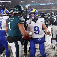 Jan 19, 2025; Philadelphia, Pennsylvania, USA; Philadelphia Eagles quarterback Jalen Hurts (1) greets Los Angeles Rams quarterback Matthew Stafford (9) after their game in a 2025 NFC divisional round game at Lincoln Financial Field.