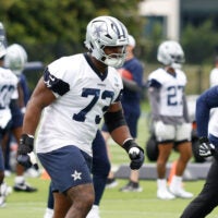 Jun 10, 2025; Arlington, TX, USA; Dallas Cowboys guard Tyler Smith (73) goes through a drill during practice at the Ford Center at the Star Training Facility in Frisco, Texas.