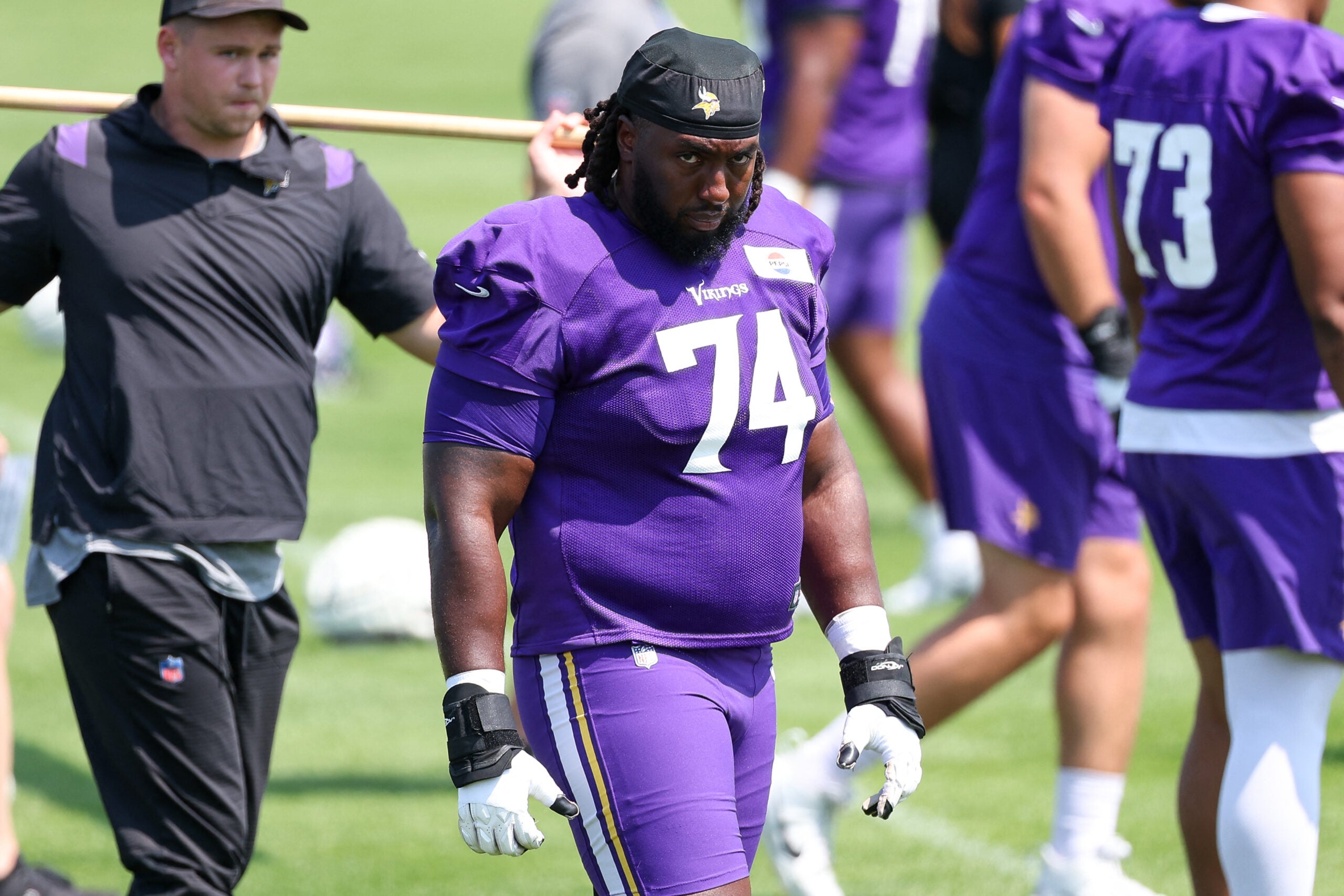 Jul 29, 2025; Eagan, MN, USA; Minnesota Vikings guard Donovan Jackson (74) takes part in drills during the teams training camp at the Minnesota Vikings Training Facility.