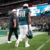 Sep 4, 2025; Philadelphia, Pennsylvania, USA; Philadelphia Eagles defensive tackle Jalen Carter (98) walks off the field with Eagles chief security officer Dom DiSandro (L) after being ejected from the game against the Dallas Cowboys at Lincoln Financial Field.