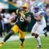 Detroit Lions safety Brian Branch (32) tackles Green Bay Packers running back Josh Jacobs (8) during the second half at Lambeau Field in Green Bay, Wis., on Sunday, September 7, 2025.