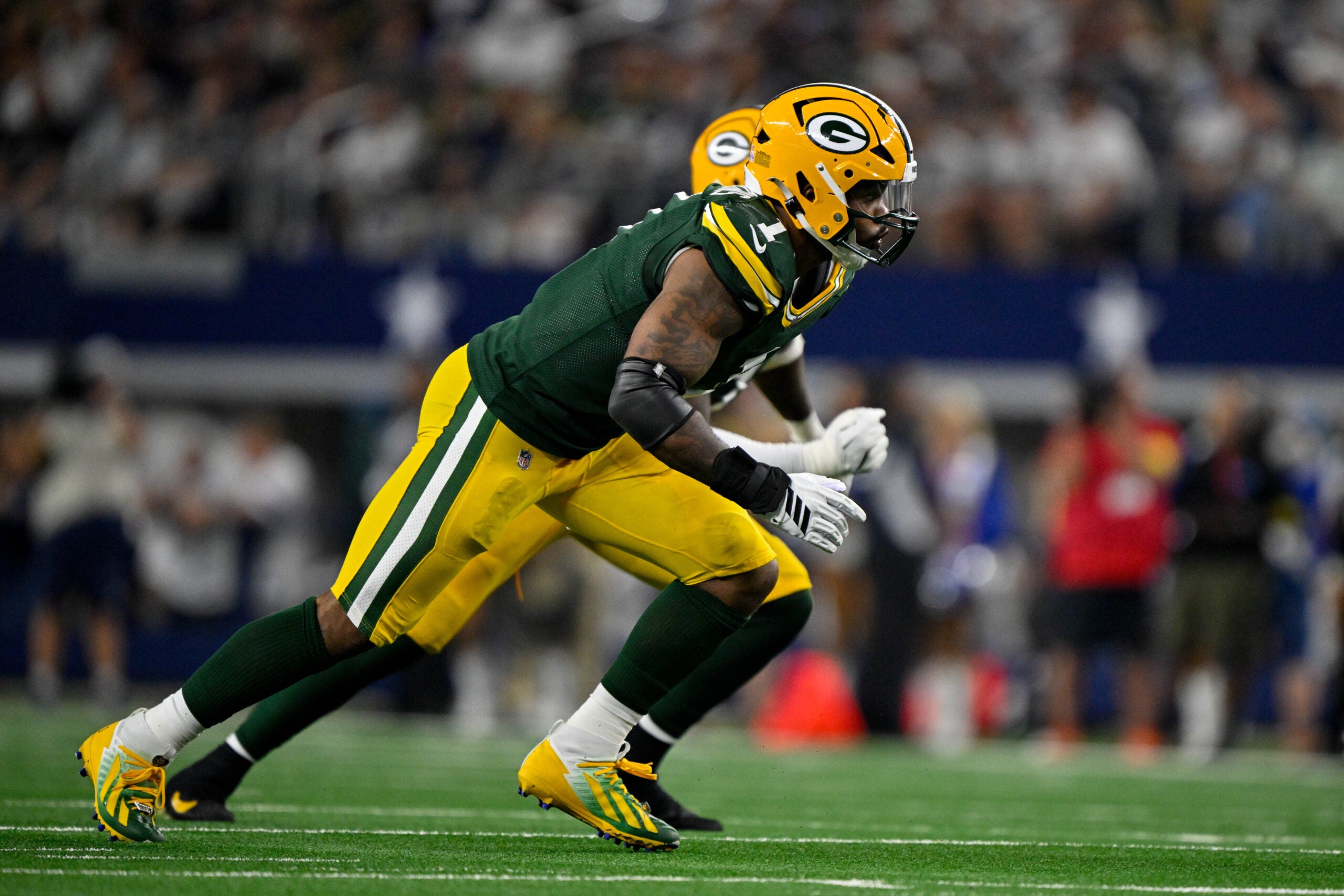 Sep 28, 2025; Arlington, Texas, USA; Green Bay Packers defensive end Micah Parsons (1) rushes the line during the game between the Dallas Cowboys and the Green Bay Packers at AT&T Stadium.