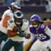 Oct 19, 2025; Minneapolis, Minnesota, USA; Philadelphia Eagles running back Saquon Barkley (26) controls the ball during the second half against the Minnesota Vikings at U.S. Bank Stadium.