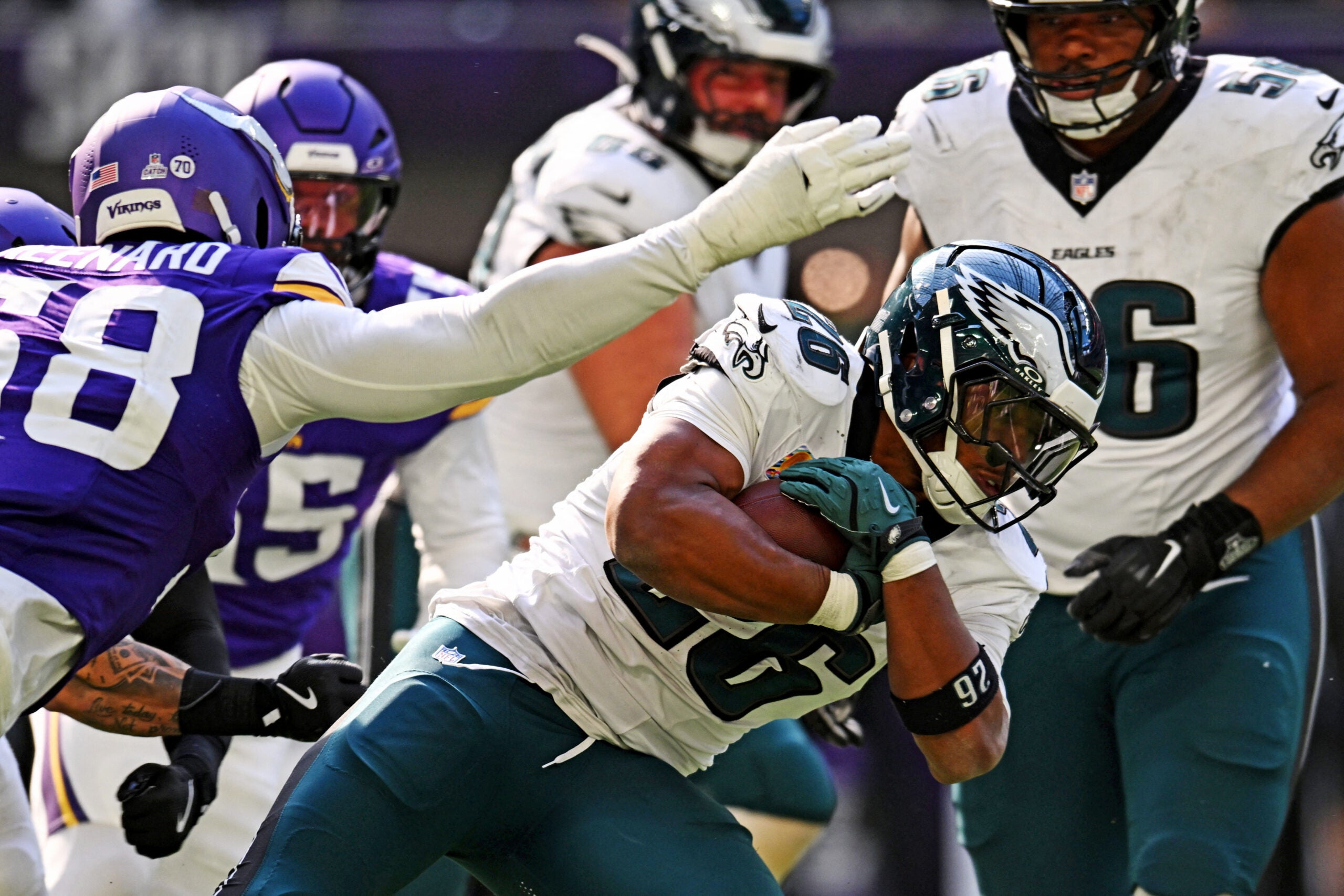 Oct 19, 2025; Minneapolis, Minnesota, USA; Philadelphia Eagles running back Saquon Barkley (26) controls the ball during the second half against the Minnesota Vikings at U.S. Bank Stadium.