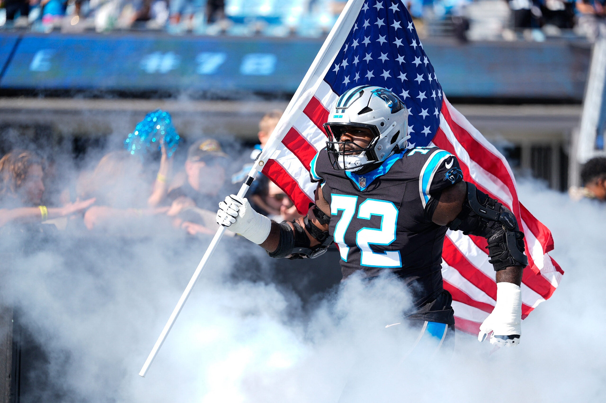 Nov 9, 2025; Charlotte, North Carolina, USA; Carolina Panthers offensive tackle Taylor Moton (72) takes the field before the game against the New Orleans Saints at Bank of America Stadium.