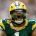 Nov 23, 2025; Green Bay, Wisconsin, USA; Green Bay Packers defensive end Micah Parsons (1) celebrates after sacking Minnesota Vikings quarterback J.J. McCarthy (9) (not pictured) during the game at Lambeau Field.