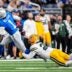 Detroit Lions wide receiver Jameson Williams (1) makes a catch against Green Bay Packers safety Xavier McKinney (29) during the first half at Ford Field in Detroit on Thursday, Nov. 27, 2025.