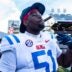 Ole Miss defensive lineman Zxavian Harris (51) smokes a cigar after a college football game between Mississippi State and Ole Miss at Davis Wade Stadium in Starkville, Miss., on Friday, Nov. 28, 2025. Ole Miss defeated Mississippi State 38-19 in the Egg Bowl.