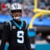 Nov 30, 2025; Charlotte, North Carolina, USA; Carolina Panthers quarterback Bryce Young (9) looks on during the first quarter against the Los Angeles Rams at Bank of America Stadium.