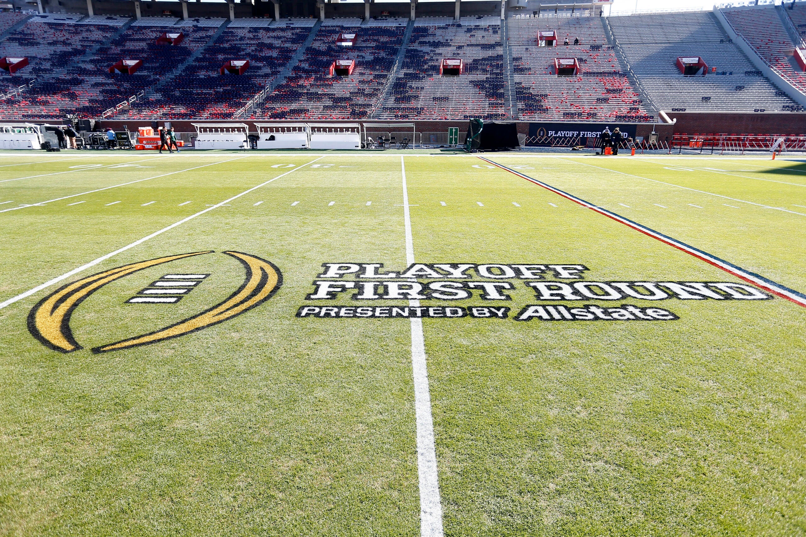 Dec 20, 2025; Oxford, MS, USA; Wide shot of the College Football First Round logo at on field prior to the game between the Tulane Green Wave and the Mississippi Rebels at Vaught-Hemingway Stadium.