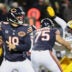 Dec 20, 2025; Chicago, Illinois, USA; Chicago Bears quarterback Caleb Williams (18) prepares to throw a pass and offensive tackle Ozzy Trapilo (75) blocks against Green Bay Packers defensive end Rashan Gary (52) during the first quarter at Soldier Field.